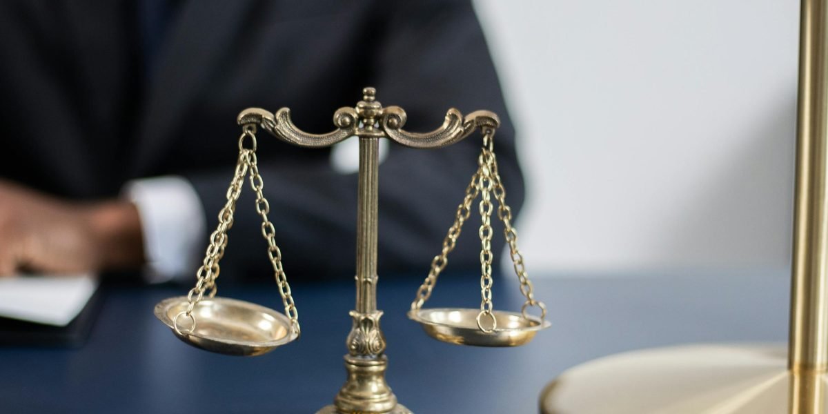 An entrepreneur contemplates crucial business decisions, recognizing the need for legal expertise beyond contracts.