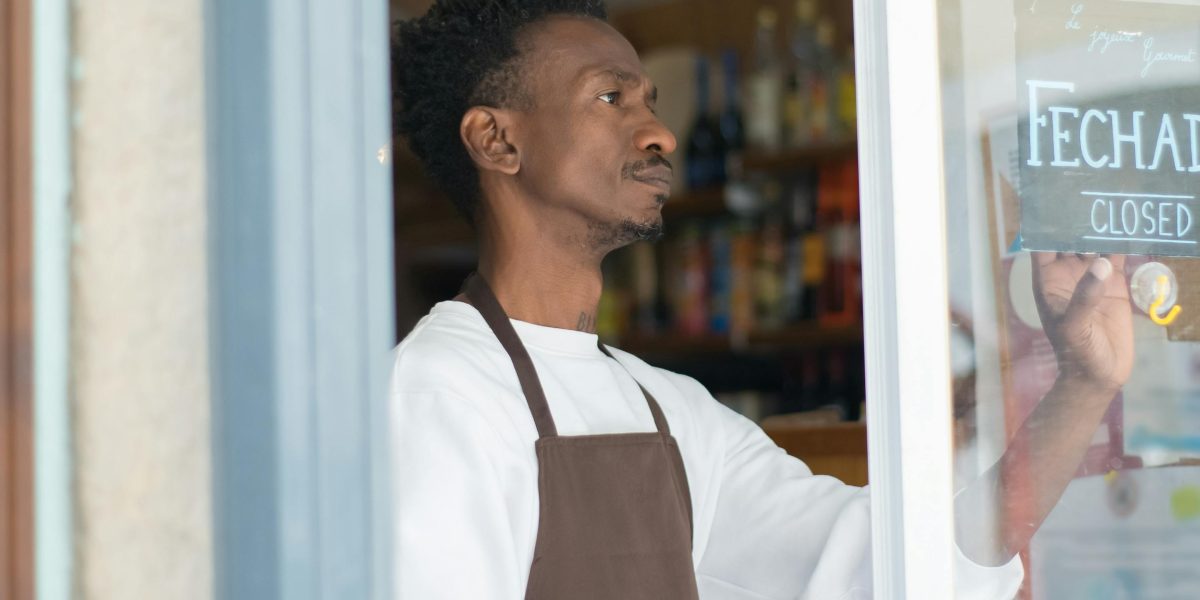 A business owner discusses ideas with a colleague, emphasizing the importance of securing intellectual property.