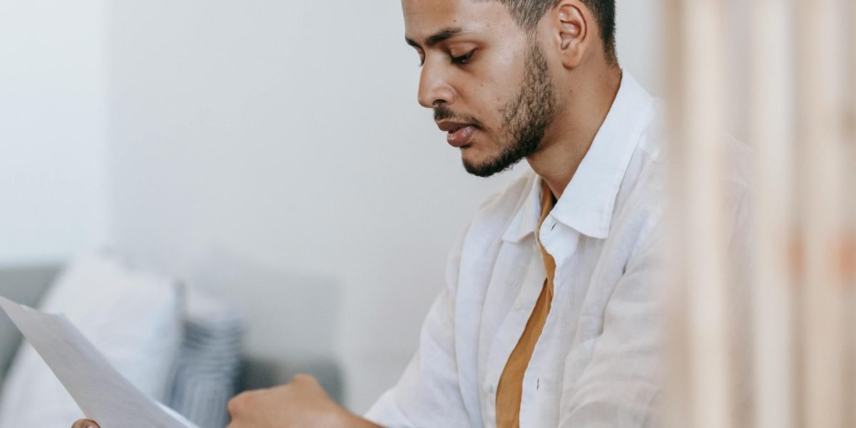 A person diligently reviewing multiple sources to cross-reference an attorney's credentials and history for a complete profile.