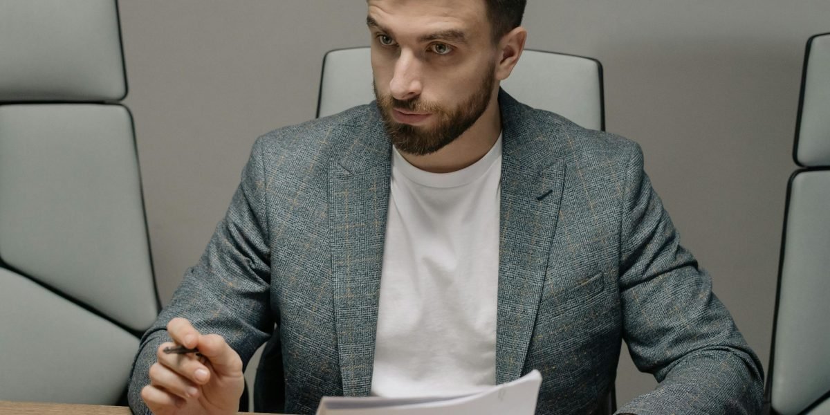 A business leader making a crucial decision, representing the careful selection of a strategic legal partner for IP.