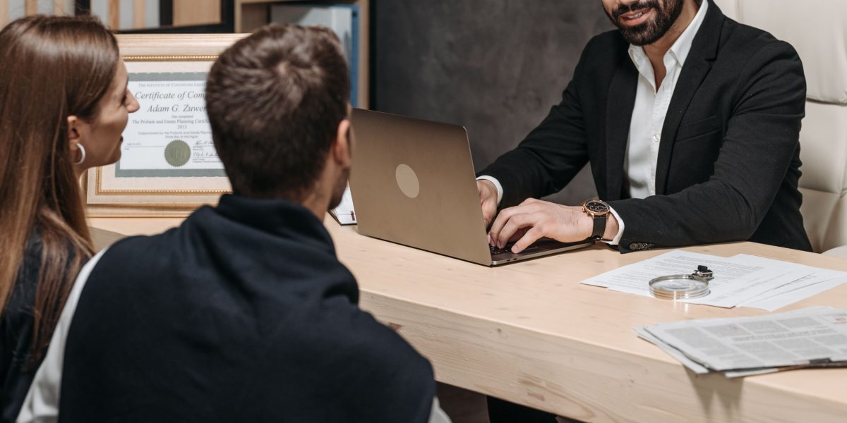 A client and their lawyer engaging in a thoughtful discussion, making informed decisions together.