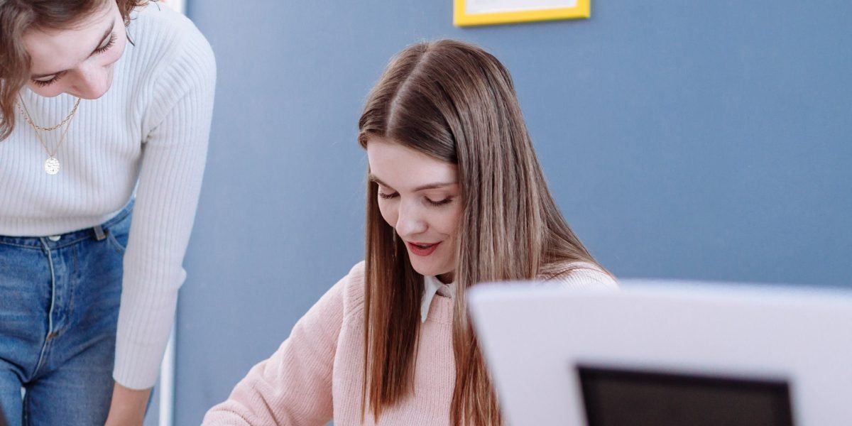 An experienced mentor guiding a younger professional, fostering career development and growth.
