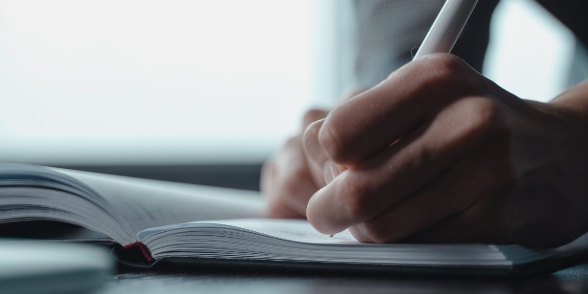 A legal professional consults a roadmap, symbolizing the journey through complex ERISA whistleblower law.