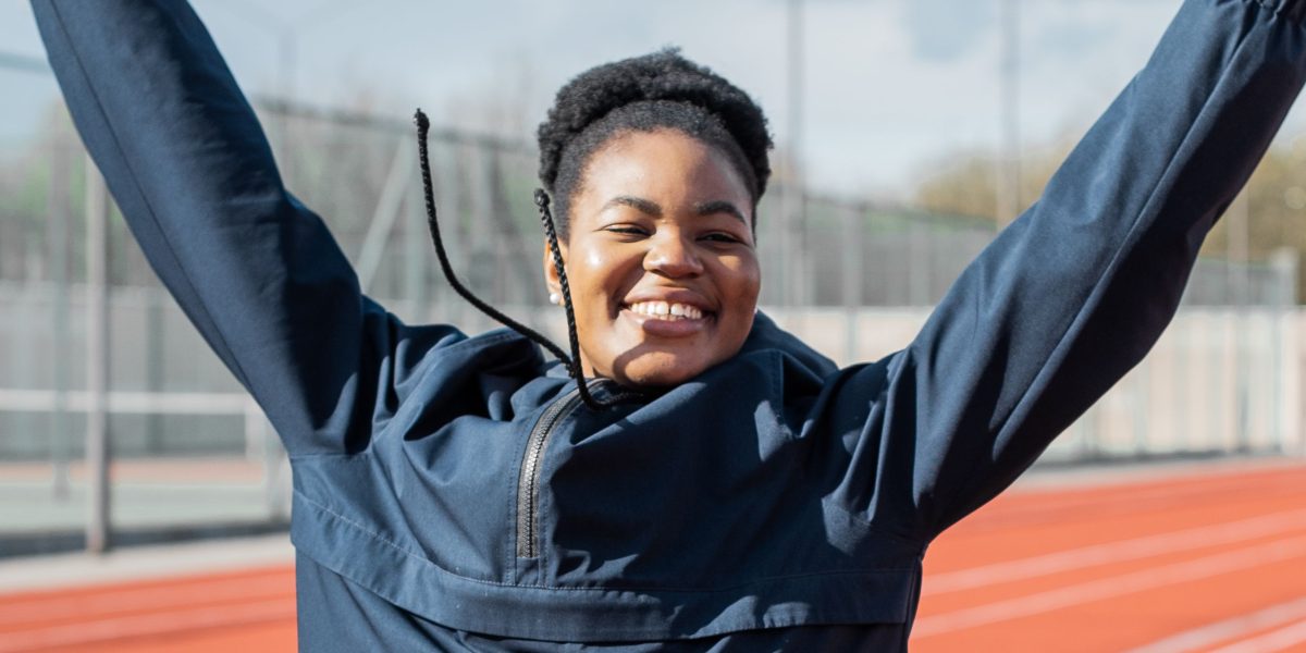 A professional celebrating a significant legal victory, representing the positive outcomes achieved in a challenging career.