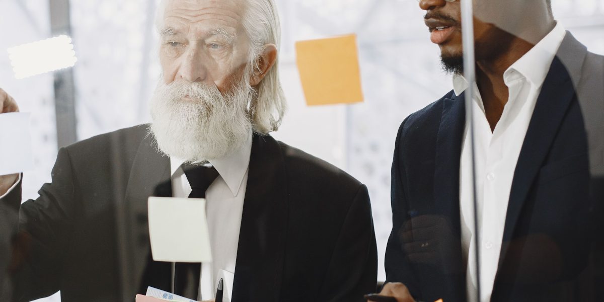 An experienced legal professional mentoring a younger attorney, fostering growth and sharing valuable insights.