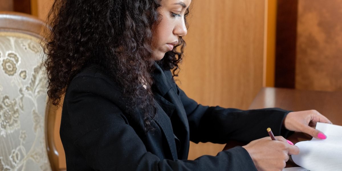 A legal professional meticulously reviewing a critical case for accuracy and validity.