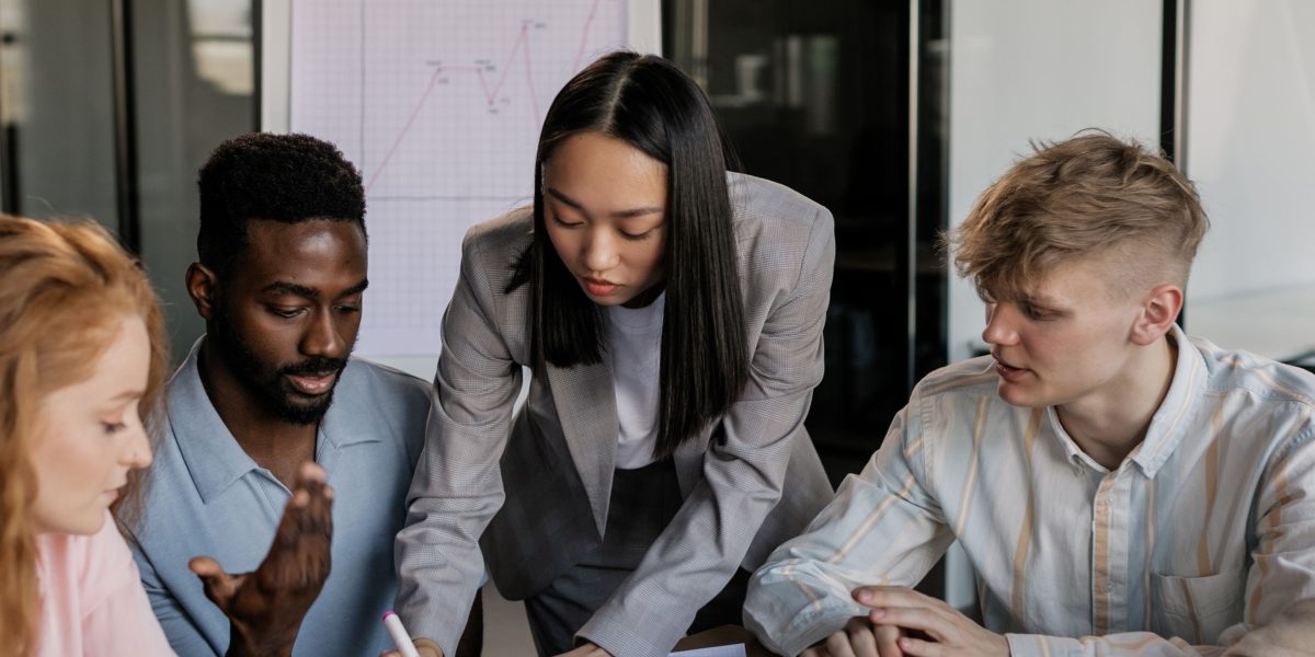 A team collaborating on an evaluation process, reflecting the strategic approach to selecting legal talent.
