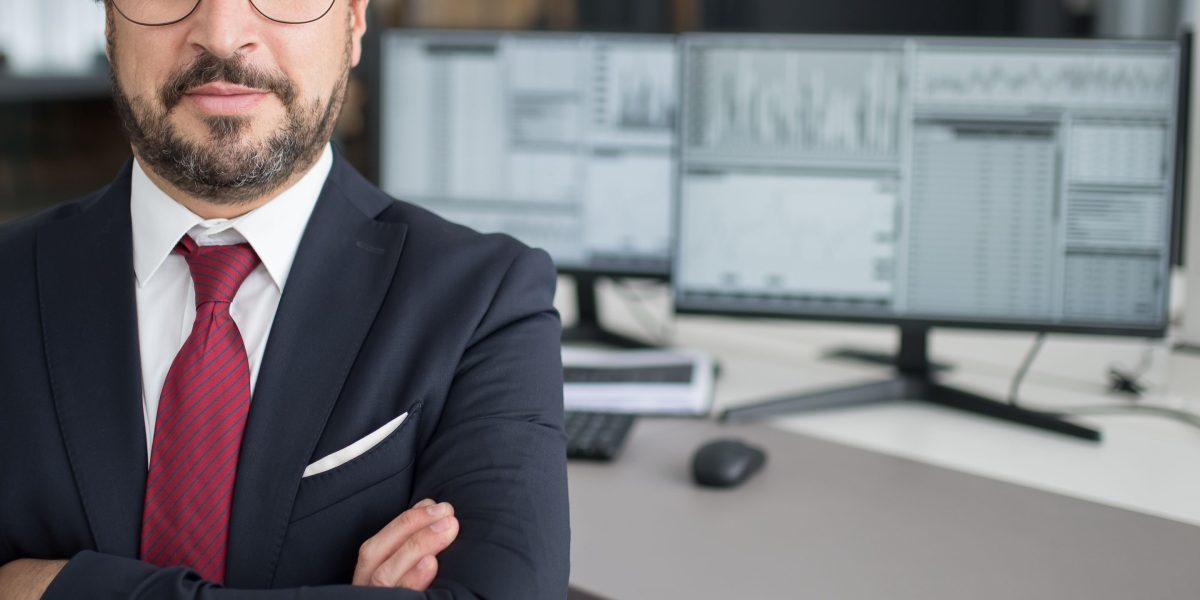 A business professional thoughtfully examining data privacy settings, emphasizing the critical importance of security in legal research.
