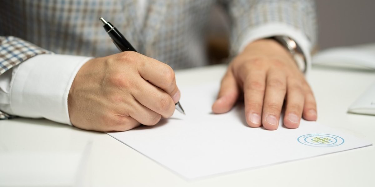A person meticulously cross-referencing information and sources to verify claims and ensure accuracy.