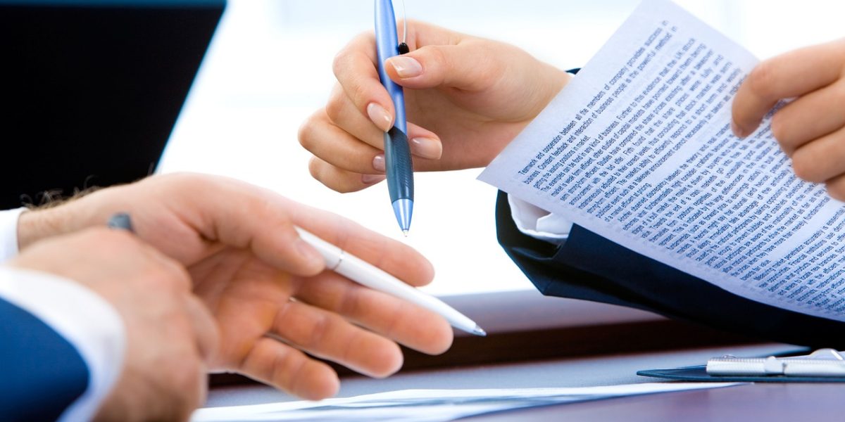 Two professionals shaking hands, symbolizing a finalized agreement and the start of a new partnership.