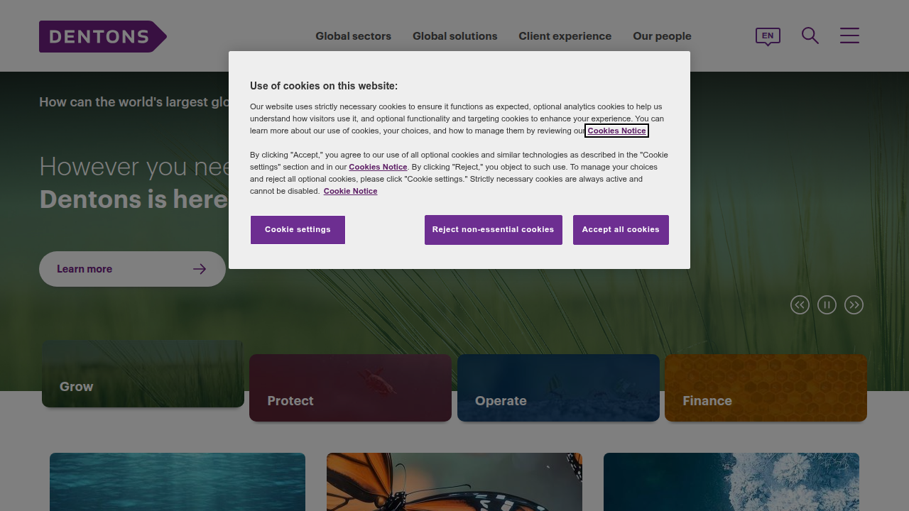 The homepage of Dentons.com, showcasing the firm's global presence and wide-ranging services.