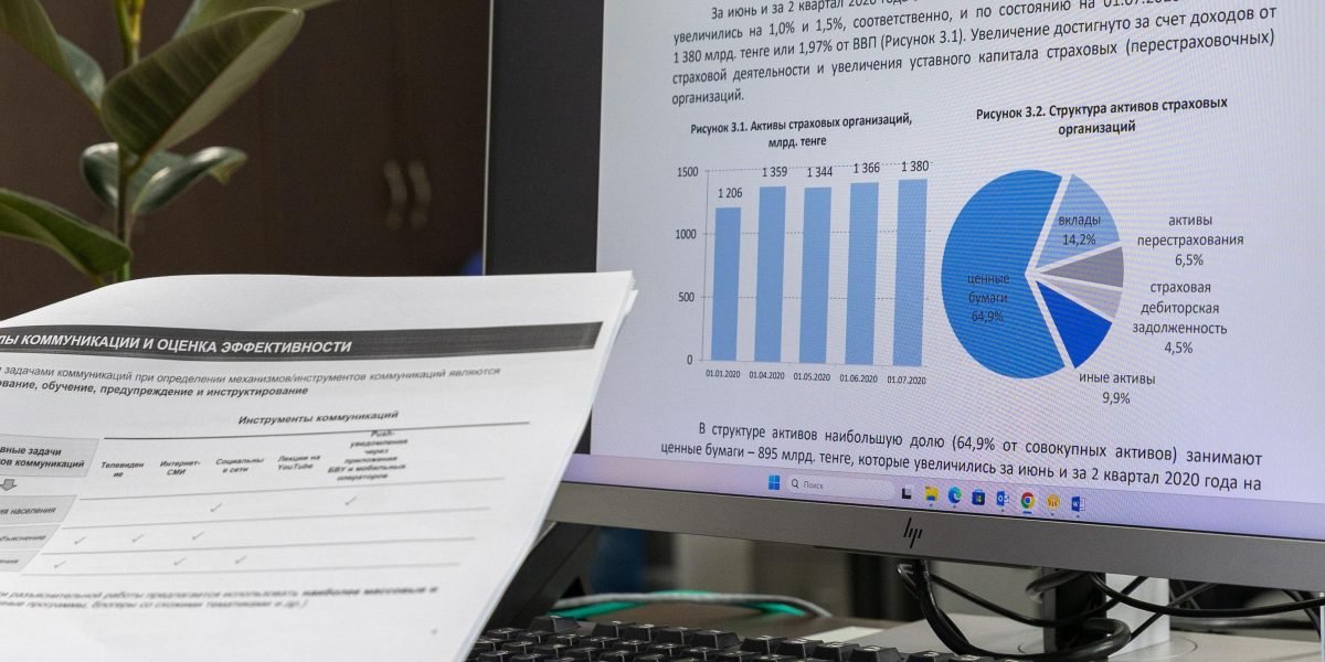 A legal professional reviewing AI governance frameworks and data privacy regulations in a modern office setting.
