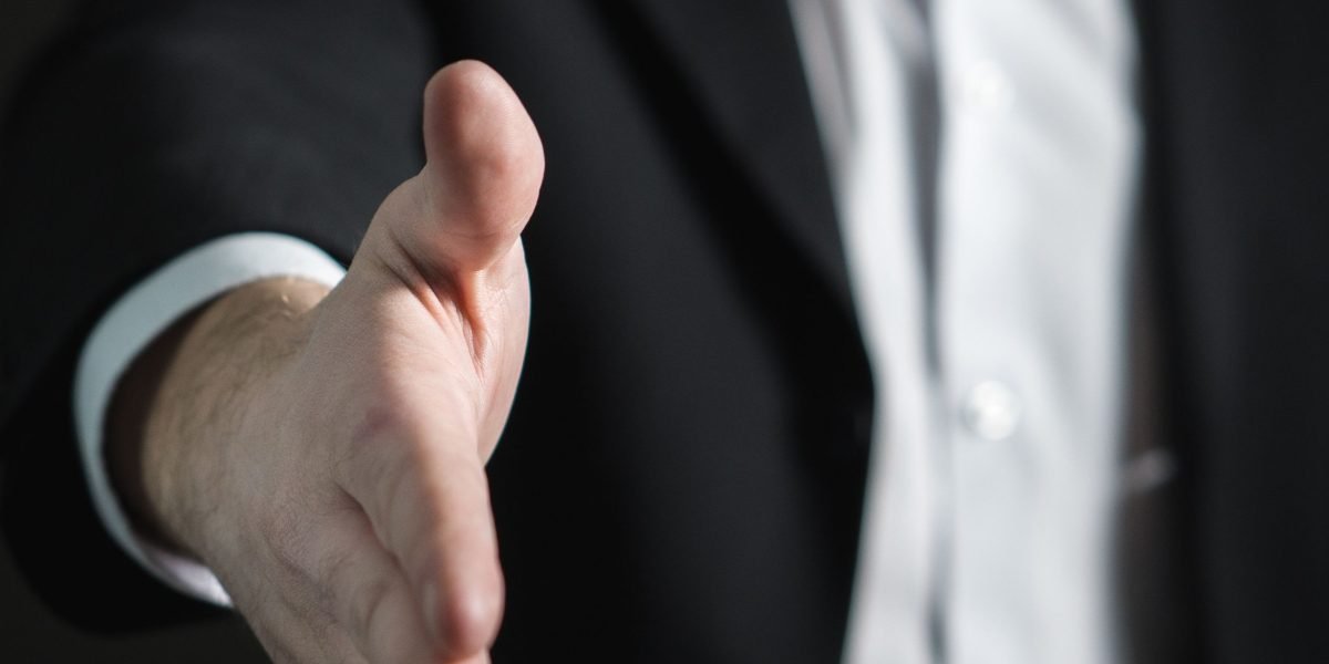 A confident candidate at a job interview, representing SCU Law graduates ready for tech-focused legal roles.