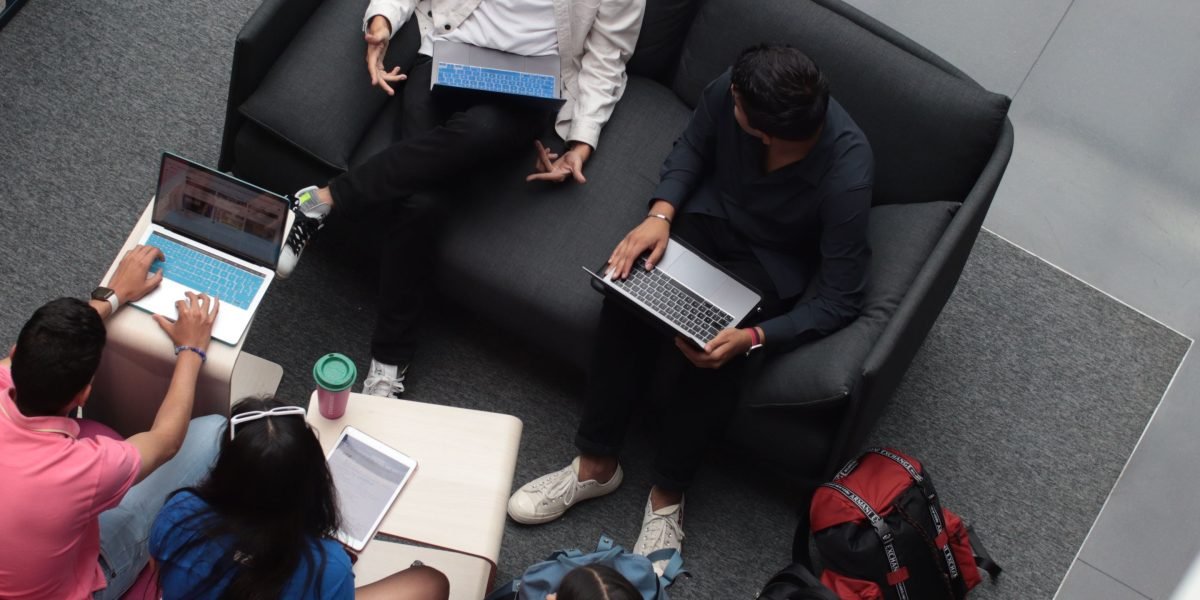 Law students engaging in a discussion, symbolizing their preparation for emerging legal technologies like AI and cybersecurity.