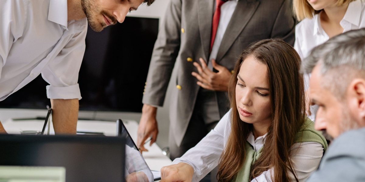 A team collaborates on complex legal strategies, utilizing advanced tools.