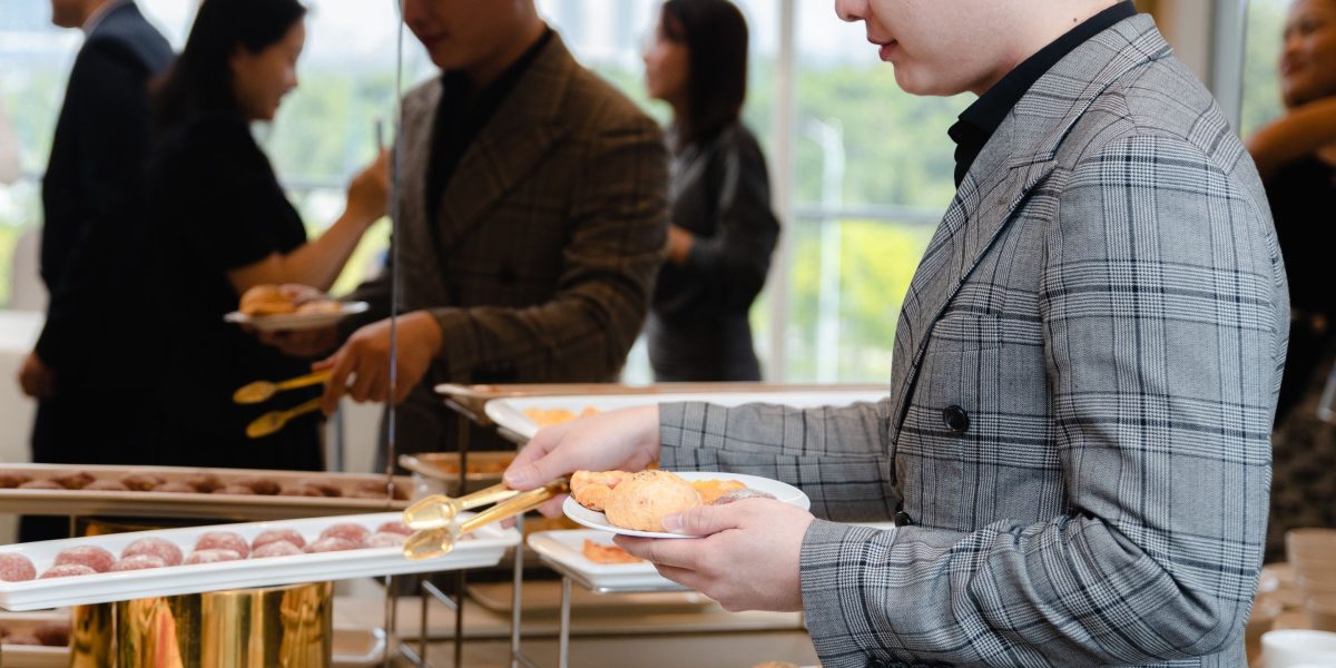 Law students and legal professionals networking at a career event, building valuable connections.