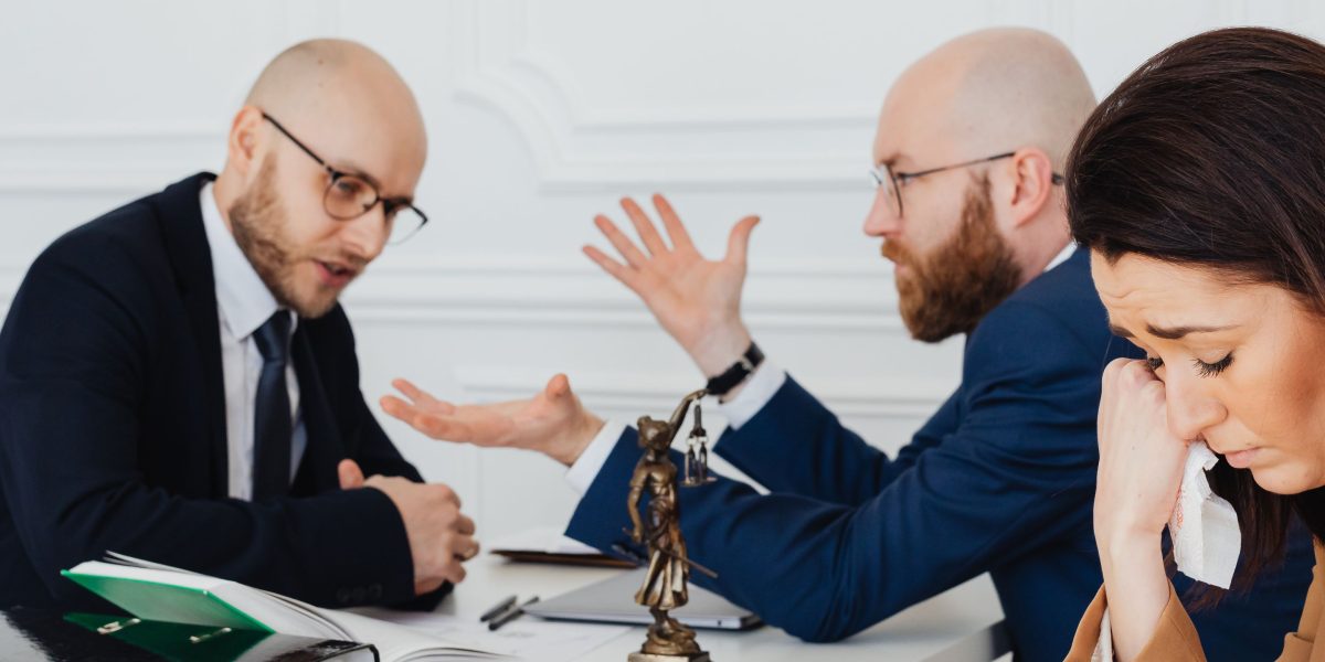 A client and attorney engage in a serious discussion about case management and expectations, emphasizing clear communication.